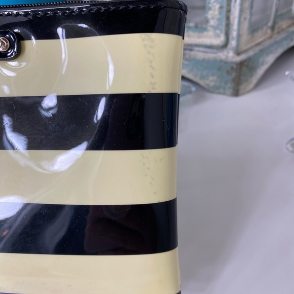 NWT Kate Spade black striped pouch